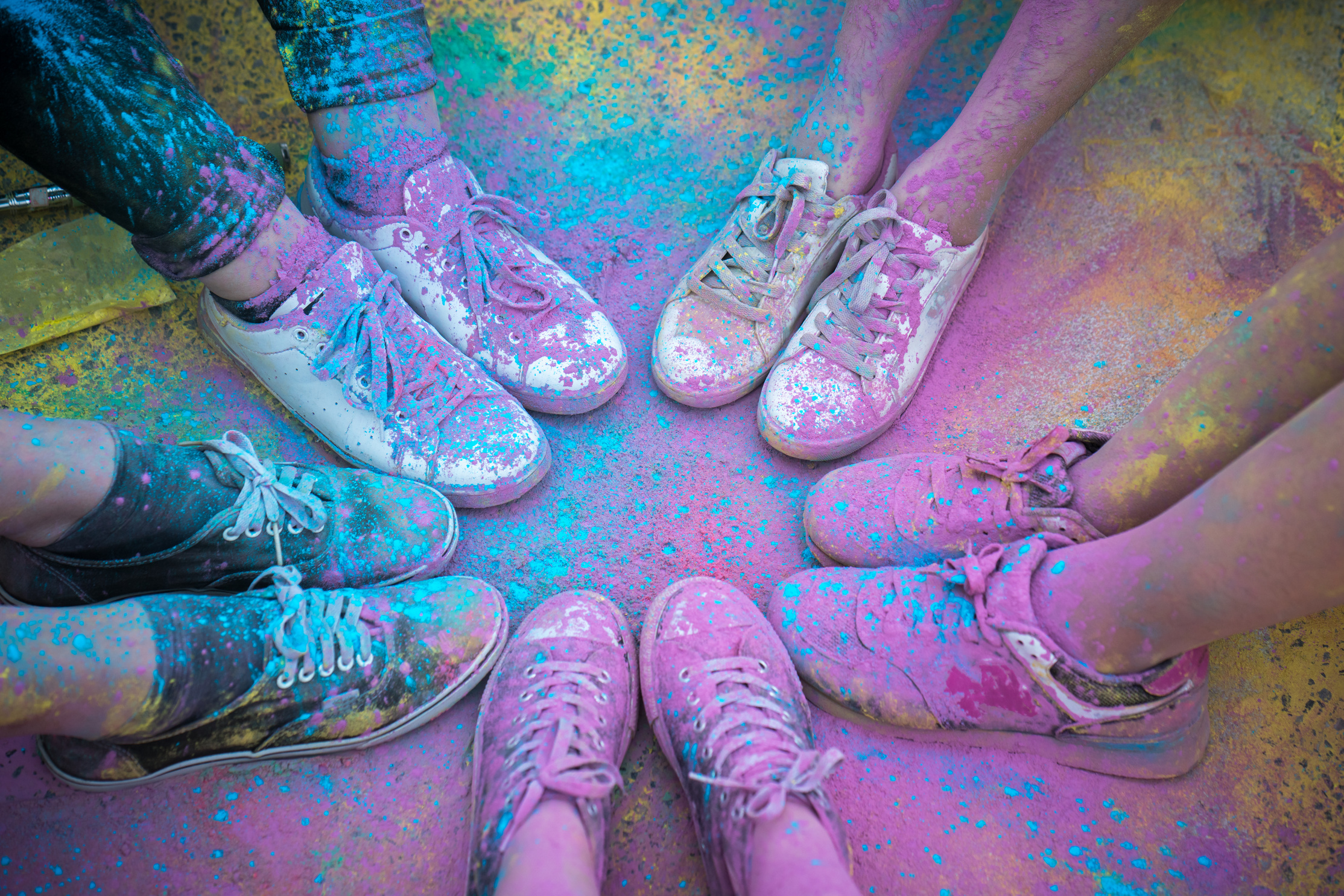 Colorful Shoes and Legs of Teenagers at Color Run Event